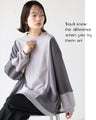 Loose and casual two-tone sweat top