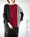 A two-tone, slimming knit top for a sophisticated look