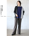 A two-tone, slimming knit top for a sophisticated look