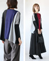 A two-tone, slimming knit top for a sophisticated look