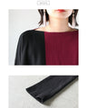 A two-tone, slimming knit top for a sophisticated look