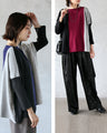 A two-tone, slimming knit top for a sophisticated look