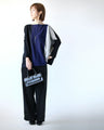 A two-tone, slimming knit top for a sophisticated look