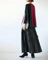 A two-tone, slimming knit top for a sophisticated look