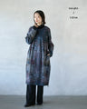 A unique patterned tunic dress that exudes atmosphere