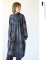 A unique patterned tunic dress that exudes atmosphere