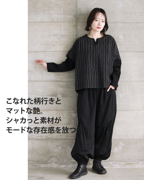 モードにシャレる。流れるストライプシャカシャカトップス