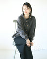 Stand-up collar with gold buttons for a comfortable fit