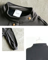 Stand-up collar with gold buttons for a comfortable fit