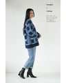 A checkered cardigan with fluffy lines that will make you fall in love at first sight