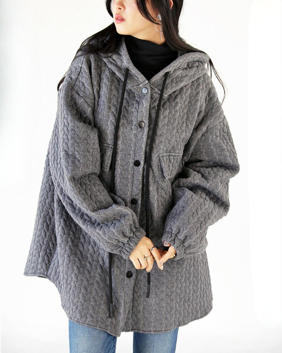 A big silhouette quilted parka with 3D leaf design for a stylish look