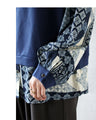 For an eye-catching look. A top with a layered look made from different materials