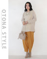 A top made of different materials with an exquisite design that looks great on its own