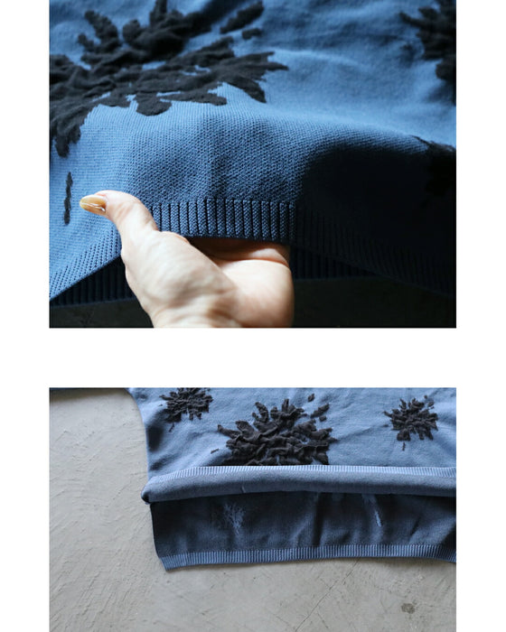 着るだけで華やぐ、モードな花 ゆったり軽やか大人ニット