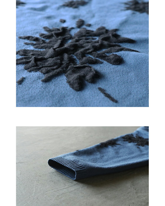 着るだけで華やぐ、モードな花 ゆったり軽やか大人ニット