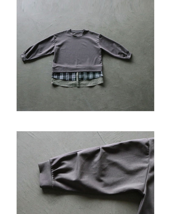 着るだけで、レイヤード上手。ドッキングデザイントップス