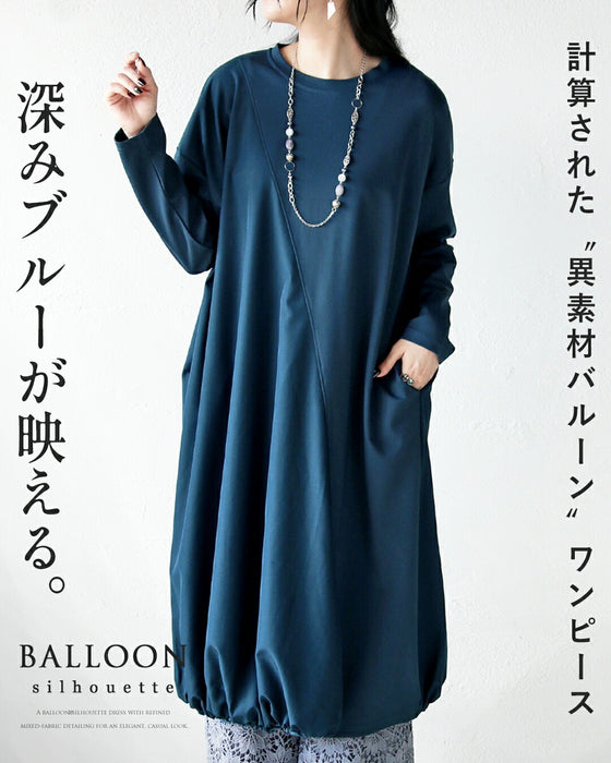 深みブルーが映える計算されたバルーンワンピース