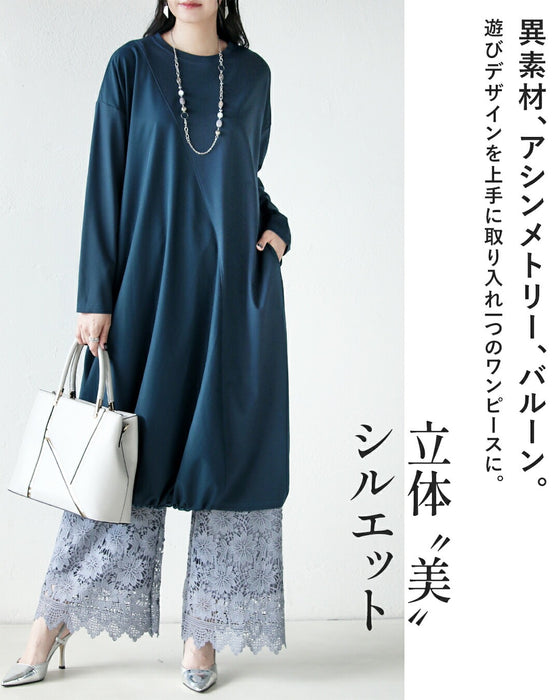 深みブルーが映える計算されたバルーンワンピース