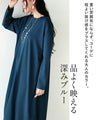 深みブルーが映える計算されたバルーンワンピース