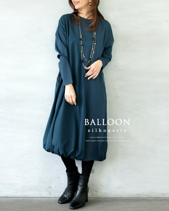 深みブルーが映える計算されたバルーンワンピース