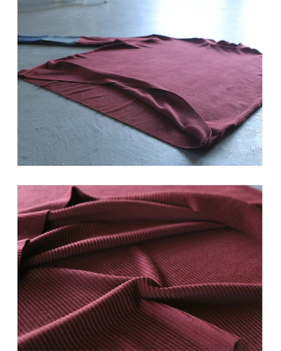 “効かせ配色”でラフに洒落る配色カラーニットソー