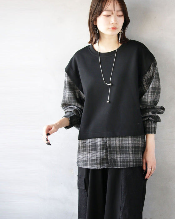 モード感と大人可愛さを一枚で チェック柄ドッキングトップス