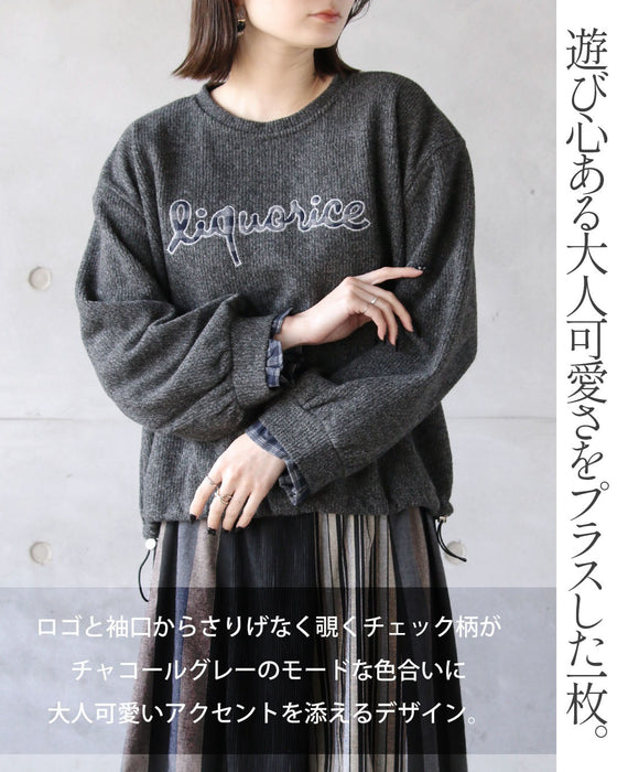 さりげないチェック柄で魅せる 異素材ロゴトップス。