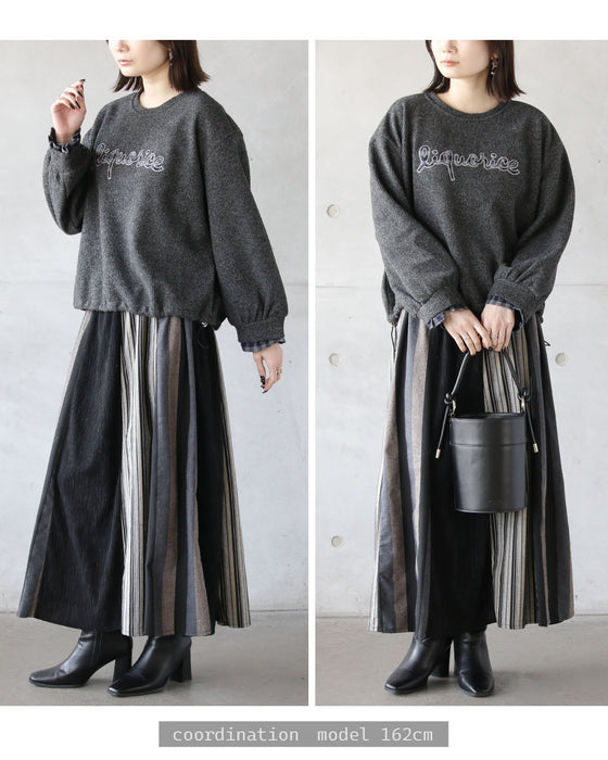 さりげないチェック柄で魅せる 異素材ロゴトップス。