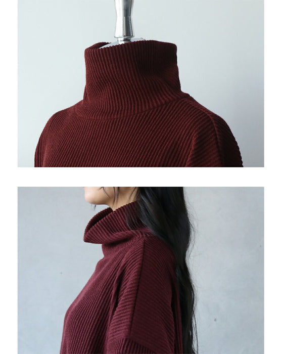 計算された切替が美しい、異素材ハイネックトップス