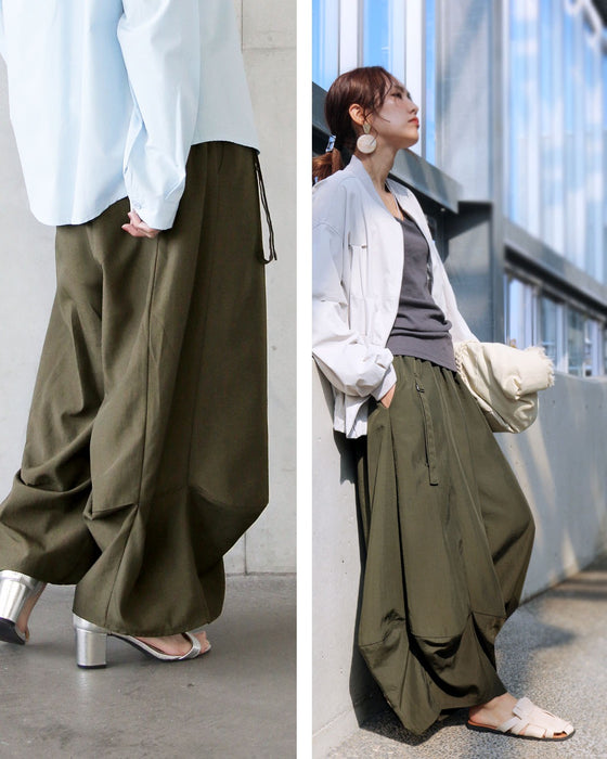 楽なのに洗練。立体タックパンツ