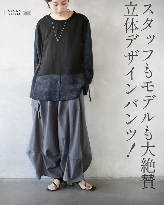 楽なのに洗練。立体タックパンツ