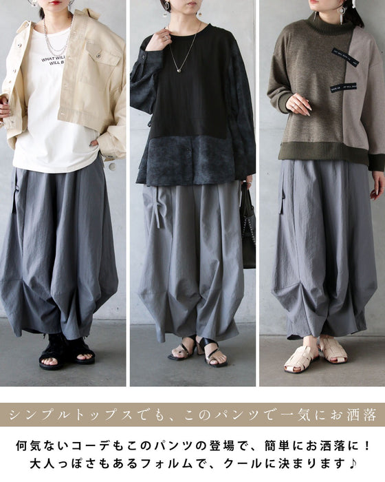 楽なのに洗練。立体タックパンツ