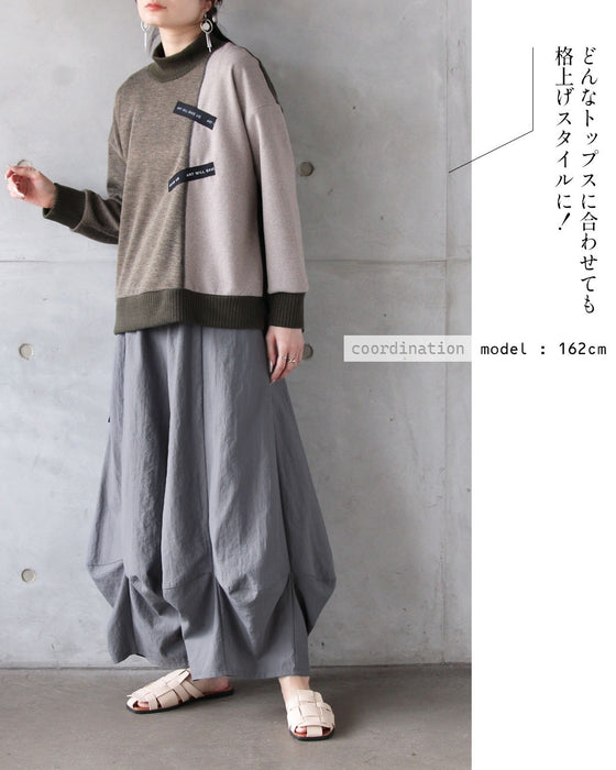 楽なのに洗練。立体タックパンツ