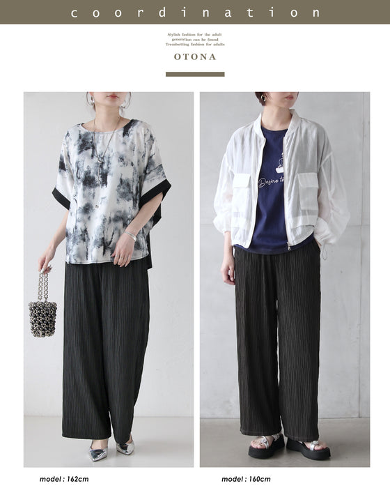 光を纏い、表情を変える。大人の洗練ラメプリーツパンツ