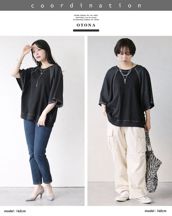 後ろボタン×ステッチ ゆるっとサマになる異素材ドルマントップス