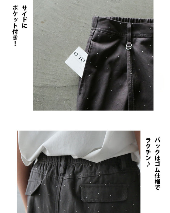 静寂な黒に一癖のアクセント 煌めくブラックパンツ