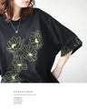 甘さを削ぎ落とした 花刺繍  配色が映えるTシャツ