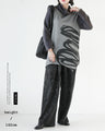 A cool and unique fashion coordination set with an art pattern deformed top