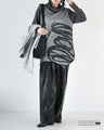 A cool and unique fashion coordination set with an art pattern deformed top