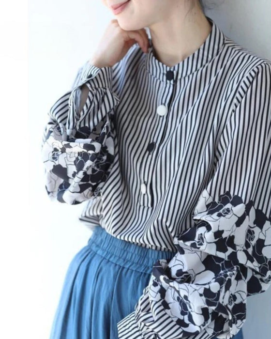 Striped blouse top with lace pattern and ruffled sleeves