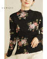 Warm and cozy with fleece lining. Elegant rose print pullover top