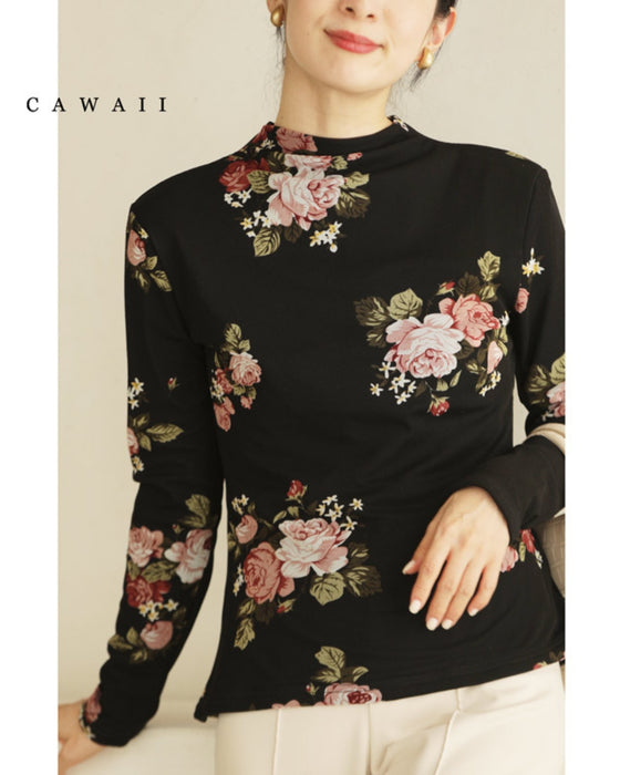 Warm and cozy with fleece lining. Elegant rose print pullover top