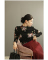 Warm and cozy with fleece lining. Elegant rose print pullover top