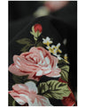 Warm and cozy with fleece lining. Elegant rose print pullover top