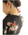 Warm and cozy with fleece lining. Elegant rose print pullover top