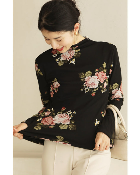 Warm and cozy with fleece lining. Elegant rose print pullover top
