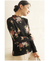 Warm and cozy with fleece lining. Elegant rose print pullover top