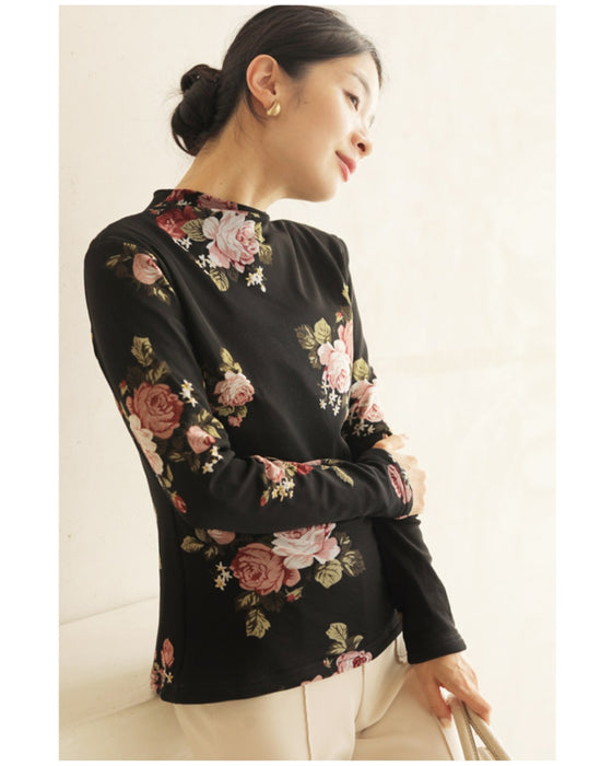 Warm and cozy with fleece lining. Elegant rose print pullover top