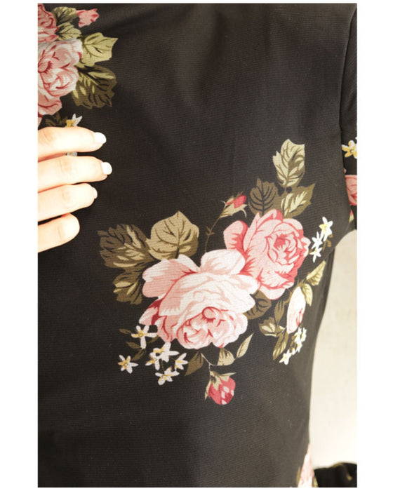 Warm and cozy with fleece lining. Elegant rose print pullover top