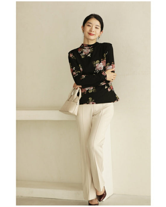 Warm and cozy with fleece lining. Elegant rose print pullover top